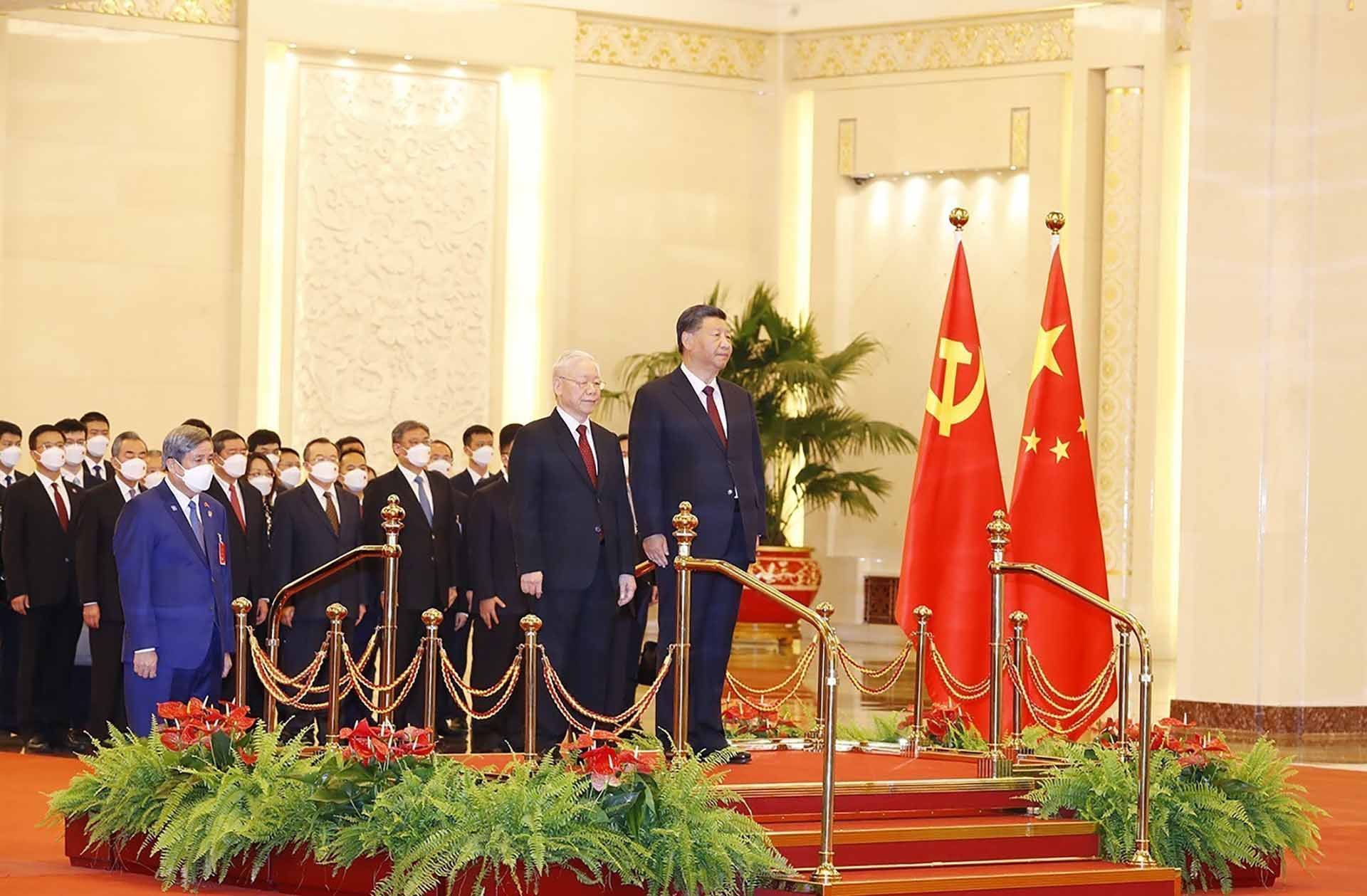 Tổng Bí thư Nguyễn Phú Trọng và Tổng Bí thư, Chủ tịch Trung Quốc Tập Cận Bình duyệt đội Danh dự. (Nguồn: TTXVN)