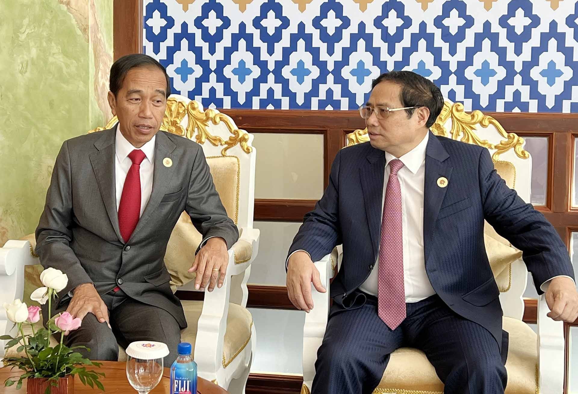 Thủ tướng Phạm Minh Chính gặp Tổng thống Indonesia Joko Widodo. (Nguồn: TTXVN)