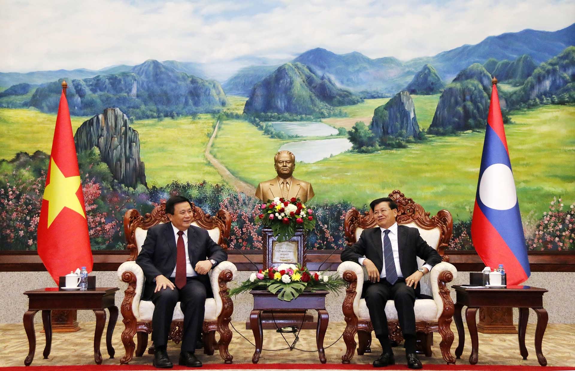 Việt Nam-Lào: Tăng cường trao đổi thông tin, nghiên cứu về lý luận và tổng kết thực tiễn