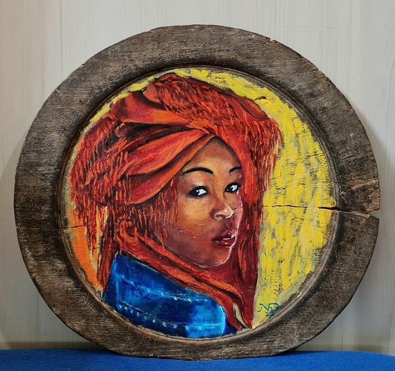 4.	Tác phẩm chân dung thiếu nữ dân tộc. Sơn dầu trên mâm gỗ đồng bào Tây Bắc- Họa sĩ Nguyễn Anh Vũ. (Ảnh: Hạnh Mi)