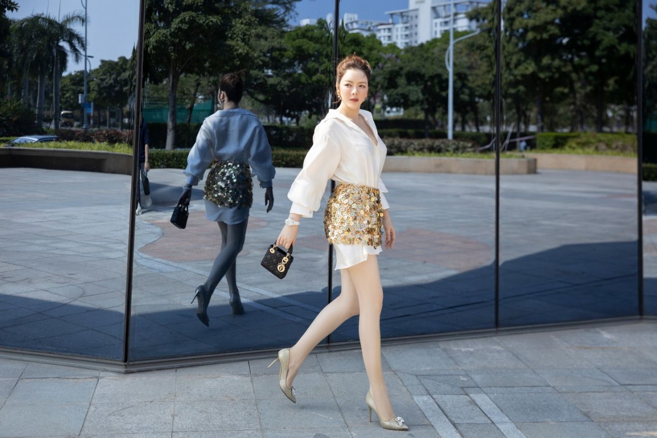 Lý Nhã Kỳ tái xuất trẻ trung tại sự kiện của Mr. Đàm