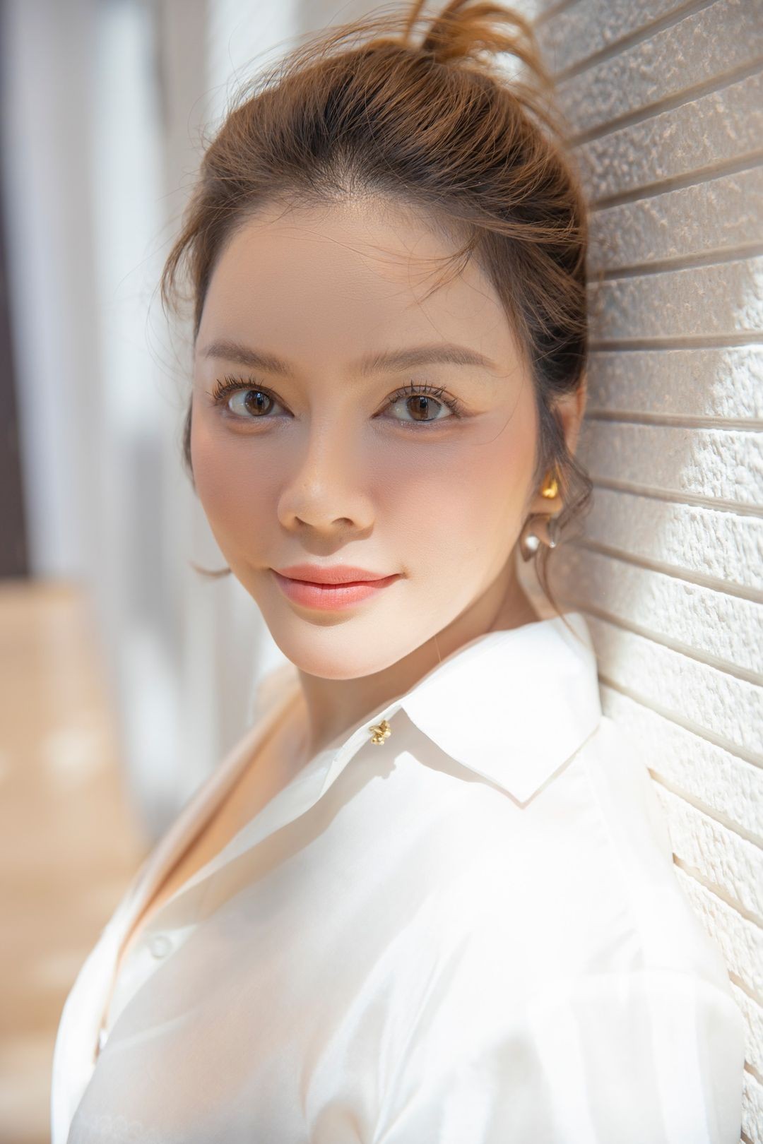 Lý Nhã Kỳ tái xuất trẻ trung tại sự kiện của Mr. Đàm