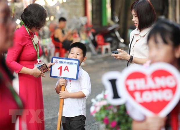 Học sinh lớp 1 tựu trường sớm nhất từ ngày 21/8. (Ảnh: Thanh Tùng/TTXVN)