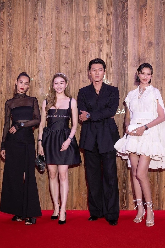 Hyun Bin cùng dàn mỹ nhân dự sự kiện tại Thụy Sỹ. Anh đứng cùng Trầm Nguyệt (con diễn viên Hong Kong (Trung Quốc) Khâu Thục Trinh), diễn viên, người mẫu Vương Đan Ni và người mẫu Nhật Bản Mizuhara Kiko. Khán giả tờ Sinchew nhận xét, Hyun Bin đứng khá tách biệt giữa dàn người đẹp thay vì gần gũi, thân mật với các cô. Các bình luận trên báo chí khen anh Dự sự kiện cùng các mỹ nhân, Hyun Bin được khen tinh tế, lịch thiệp