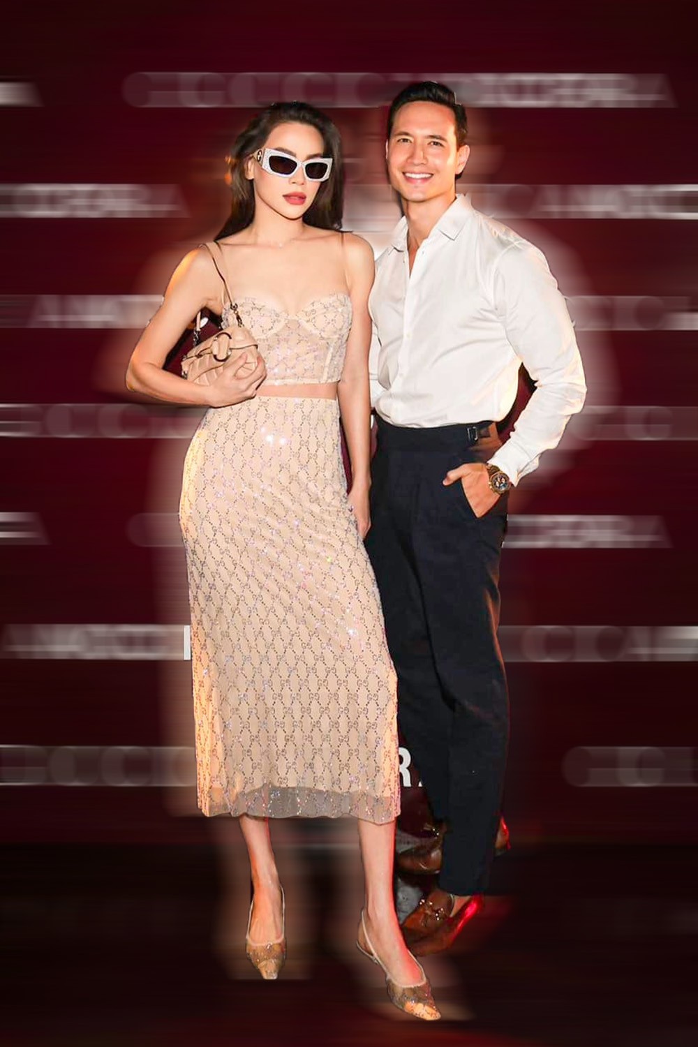 Hồ Ngọc Hà dự tiệc tối cùng ông xã Kim Lý với bộ trang phục hoạ tiết monogram màu da, phối cùng phụ kiện là kính mắt và túi xách cùng tông màu. Chiếc crop top cúp ngực hai dây được giọng ca ‘Cô đơn trên sofa’ lựa chọn nhằm tôn phần eo thon, vai trần quyến rũ. 