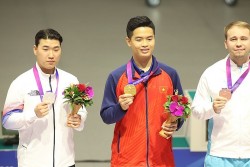 ASIAD 19: VĐV môn bắn súng Phạm Quang Huy mang Huy chương vàng đầu tiên cho đoàn thể thao Việt Nam