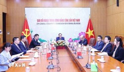 Trưởng ban Đối ngoại Trung ương trao đổi, hội đàm trực tuyến với lãnh đạo Đảng FLN Algeria