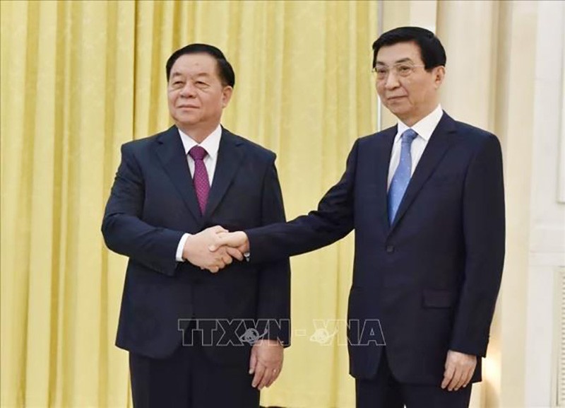 Trưởng ban Tuyên giáo Trung ương Nguyễn Trọng Nghĩa hội kiến đồng chí Vương Hộ Ninh, Ủy viên Thường vụ Bộ Chính trị, Chủ tịch Chính hiệp toàn quốc Trung Quốc. (Nguồn: TTXVN)