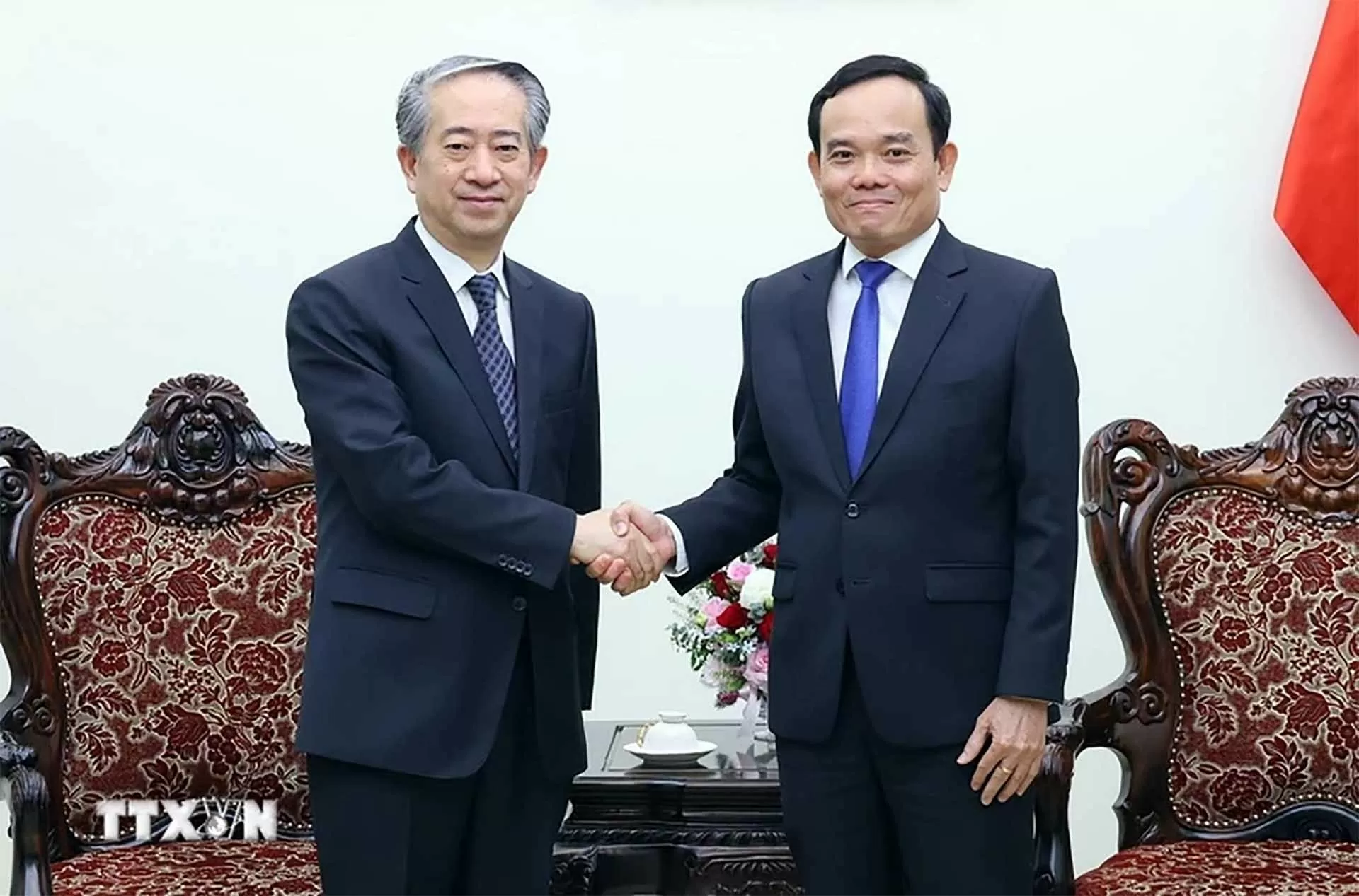 Phó Thủ tướng Trần Lưu Quang tiếp Đại sứ Trung Quốc tại Việt Nam Hùng Ba đến chào từ biệt. (Nguồn: TTXVN)