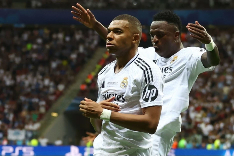 Sau danh hiệu Siêu cúp châu Âu, Mbappe tự tin tỏa sáng khi ra mắt sân chơi La Liga. Mbappe ghi bàn ngay trong trận ra mắt màu áo mới. (Nguồn: Vietnamnet) Sau danh hiệu Siêu cúp châu Âu, Mbappe tự tin tỏa sáng khi ra mắt sân chơi La Liga. Mbappe ghi bàn ngay trong trận ra mắt màu áo mới. (Nguồn: Vietnamnet)