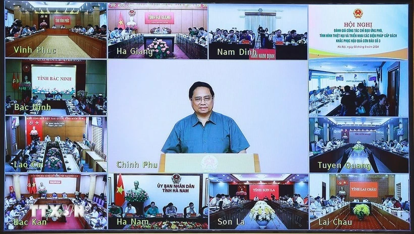 Thủ tướng chủ trì hội nghị trực tuyến với các địa phương để đánh giá thiệt hại và khắc phục hậu quả cơn bão số 3. (Ảnh: Dương Giang/TTXVN) Thủ tướng chủ trì hội nghị trực tuyến với các địa phương để đánh giá thiệt hại và khắc phục hậu quả cơn bão số 3. (Ảnh: Dương Giang/TTXVN)