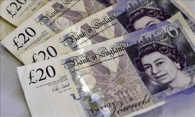 Đồng bảng giảm đẩy chứng khoán Anh tăng kỷ lục Đồng bảng giảm đẩy chứng khoán Anh tăng kỷ lục