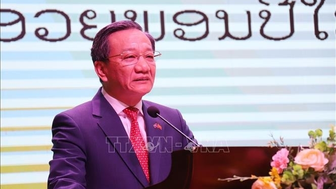 dai su quan viet nam tai lao to chuc tet mung dang mung xuan at ty 2025