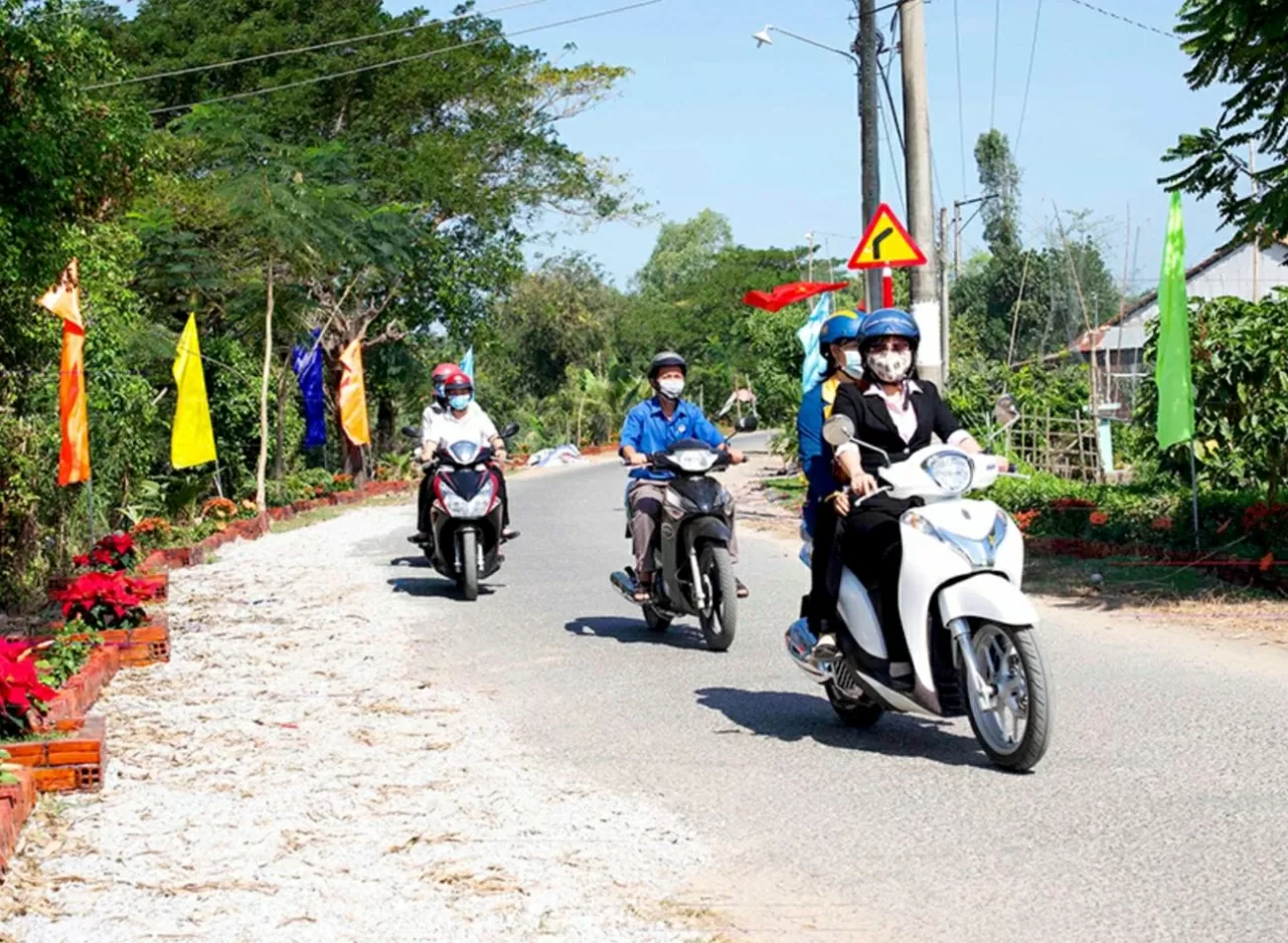 Một góc xuân ở phum sóc ấp Tha La (xã Ngọc Biên, huyện Trà Cú, tỉnh Trà Vinh) với sinh khí đón Tết Nguyên đán của bà con Khmer thêm rộn ràng. (Ảnh: Phương Nghi) Một góc xuân ở phum sóc ấp Tha La (xã Ngọc Biên, huyện Trà Cú, tỉnh Trà Vinh) với sinh khí đón Tết Nguyên đán của bà con Khmer thêm rộn ràng. (Ảnh: Phương Nghi)