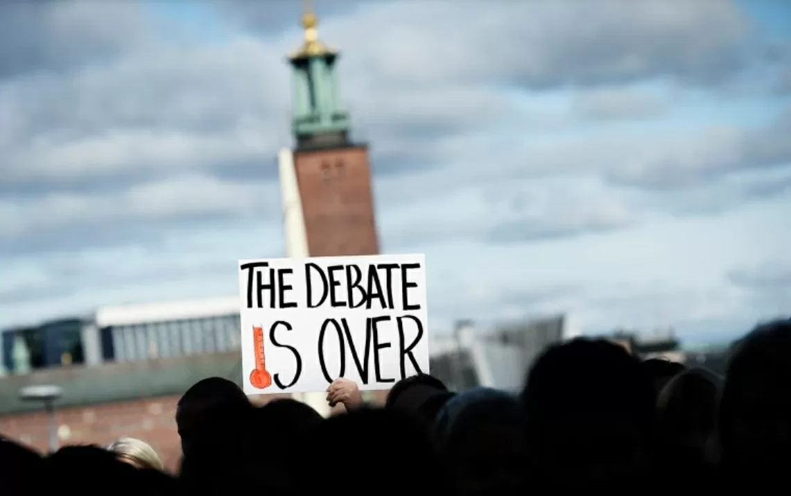 Những người biểu tình bên ngoài cuộc họp của IPCC ở Thụy Điển năm 2013 kêu gọi các nhà hoạch định chính sách chấp nhận rằng con người đang làm nóng hành tinh. (Nguồn: AFP/Getty)