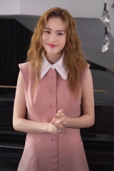 Hoàng Thùy Linh ưa thích phong cách thời trang tối giản, che vóc dáng