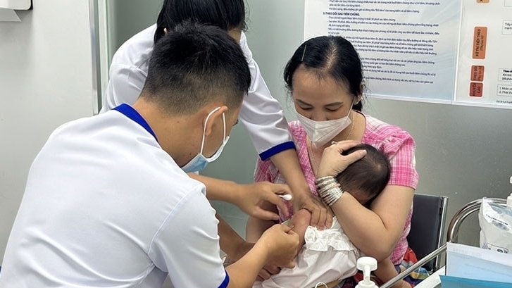 ha noi di tung ngo go tung nha thuc hien chien dich tiem chung vaccine phong chong benh soi