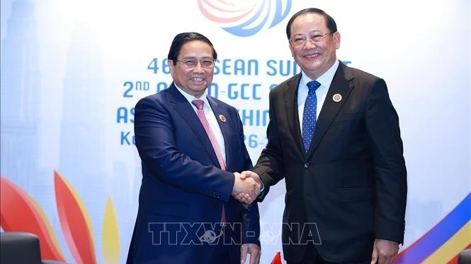 thu tuong pham minh chinh gap thu tuong lao phoi hop chat che trien khai hieu qua cac thoa thuan cap cao giua hai nuoc