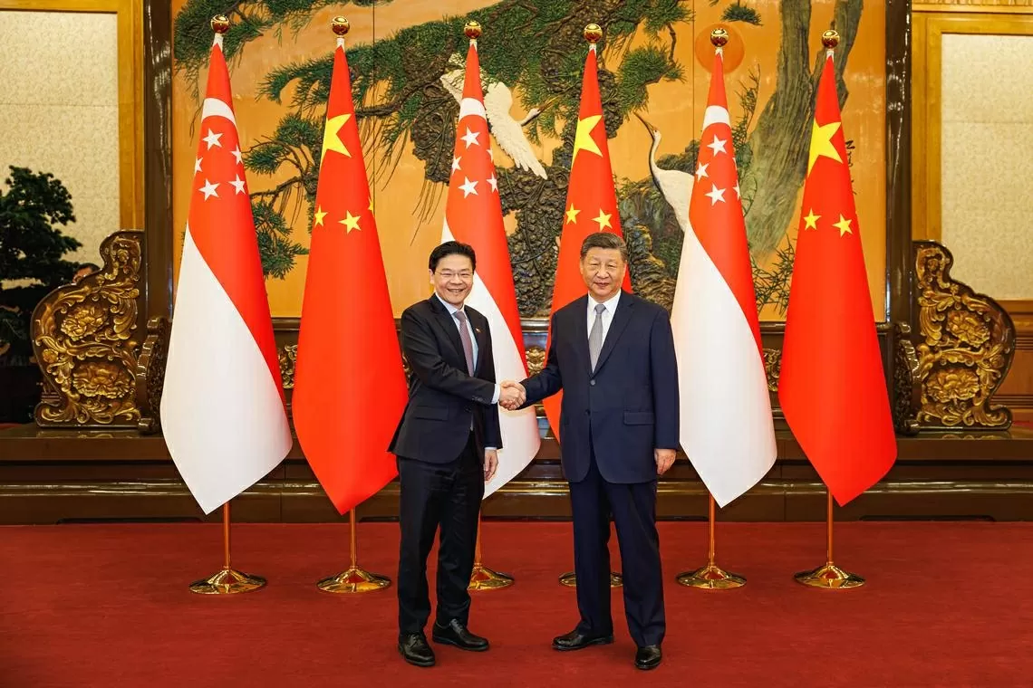 Chủ tịch Trung Quốc đón tiếp Thủ tướng Singapore thăm Bắc Kinh, khẳng định: Thế giới không thể quay lại với chủ nghĩa bá quyền hay luật rừng Chủ tịch Trung Quốc đón tiếp Thủ tướng Singapore thăm Bắc Kinh, khẳng định: Thế giới không thể quay lại với chủ nghĩa bá quyền hay luật rừng