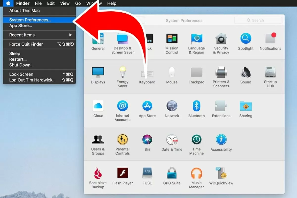 Mở MacBook và vào phần System Preferences. Mở MacBook và vào phần System Preferences.