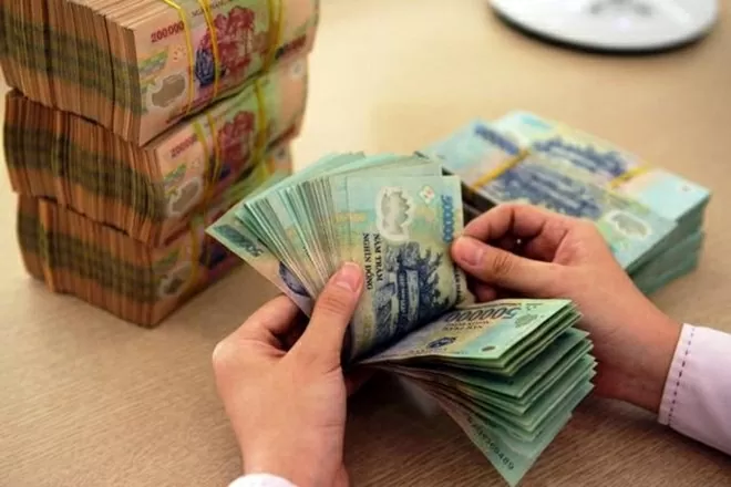 Thủ tướng chỉ đạo tăng cường hiệu quả điều hành chính sách tiền tệ, chính sách tài khóa. (Ảnh minh họa: VGP)