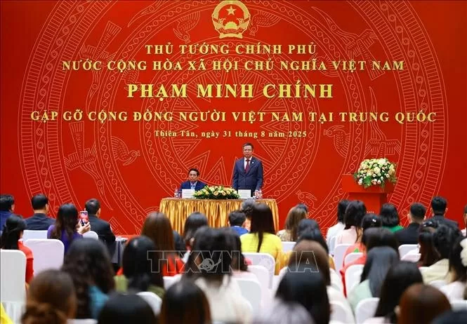 Thủ tướng Phạm Minh Chính gặp gỡ kiều bào tại Trung Quốc. (Nguồn: TTXVN)
