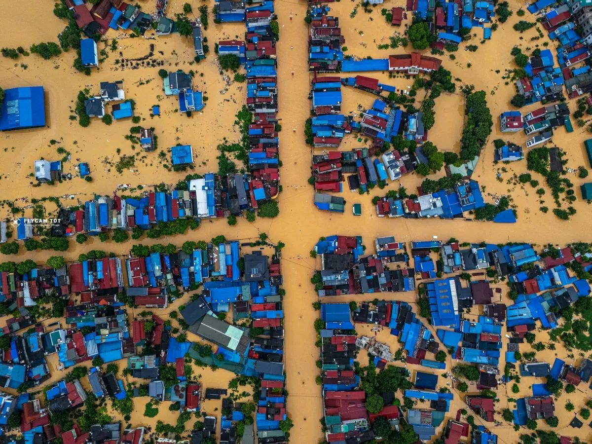 Mưa lũ cảnh tỉnh con người Mưa lũ cảnh tỉnh con người