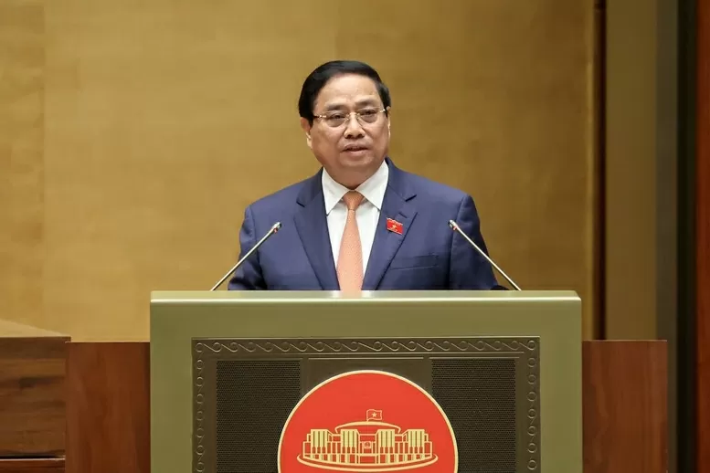Thủ tướng Chính phủ Phạm Minh Chính trình bày Báo cáo kết quả thực hiện kế hoạch phát triển kinh tế-xã hội năm 2025 và 5 năm 2021-2025; dự kiến kế hoạch phát triển kinh tế-xã hội năm 2026. (Ảnh: Nhật Bắc)