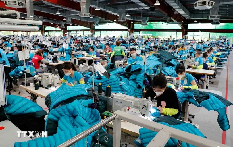 May mặc là một trong những mặt hàng xuất khẩu chủ lực của Việt Nam. (Nguồn: TTXVN) May mặc là một trong những mặt hàng xuất khẩu chủ lực của Việt Nam. (Nguồn: TTXVN)