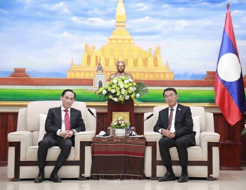 Đặc phái viên của Tổng Bí thư Tô Lâm, đồng chí Lê Hoài Trung, BTTWĐ, Bộ trưởng Ngoại giao sang chúc mừng Đại hội lần thứ XII Đảng NDCM Lào