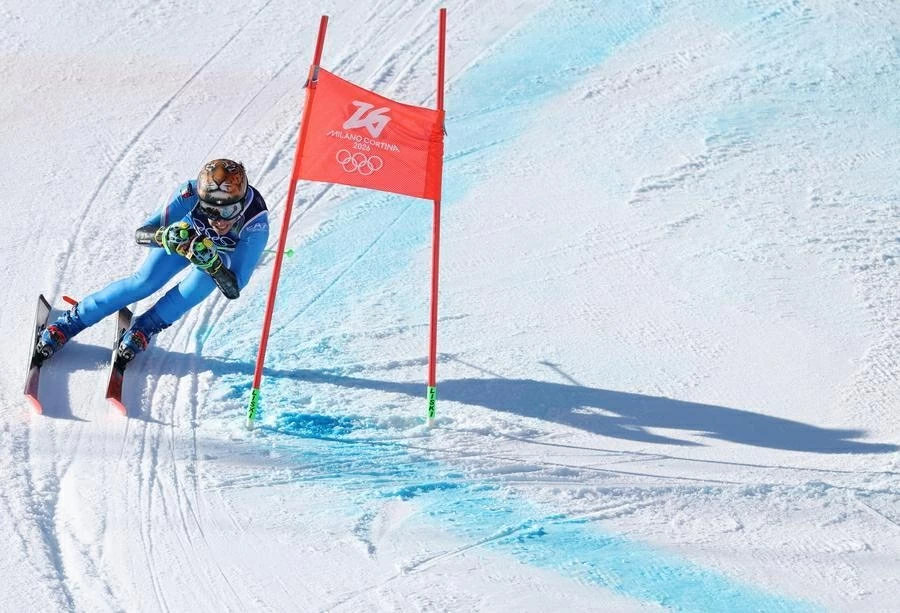 Tại đấu trường Cortina d'Ampezzo, vận động viên chủ nhà Federica Brignone đã xuất sắc giành Huy chương Vàng nội dung trượt tuyết đổ đèo khổng lồ nữ. Với tổng thành tích 2 phút 13,50 giây, ngôi sao 35 tuổi người Italy đã có tấm Huy chương Vàng thứ hai trong sự nghiệp tại các kỳ Thế vận hội. (Nguồn: Xinhua)