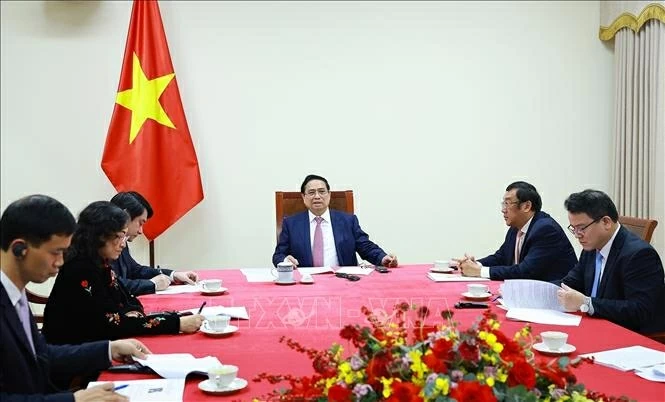 Thủ tướng Phạm Minh Chính điện đàm với Tổng thống Angola João Manuel Gonçalves Lourenço. Ảnh: Dương Giang-TTXVN