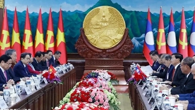 Điện mừng Lãnh đạo Lào