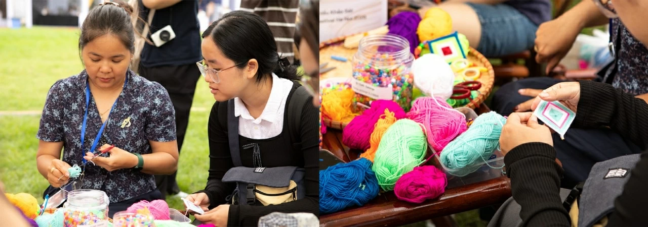 Ngoài ra, khu vực trải nghiệm với các hoạt động làm đồ thủ công và trò chơi dân gian cũng trở thành điểm dừng chân thu hút đông đảo công chúng, đặc biệt là giới trẻ. Tại đây, du khách có thể trực tiếp tham gia vào quá trình tạo nên những sản phẩm mang đậm dấu ấn văn hóa Thái Lan như làm hoa đăng, trang trí vật phẩm thủ công hay thử sức với các kỹ thuật truyền thống dưới sự hướng dẫn của nghệ nhân.  Nhiều bạn trẻ kiên nhẫn ngồi hàng giờ để hoàn thiện sản phẩm của mình, vừa làm vừa trao đổi, khám phá thêm về ý nghĩa văn hóa ẩn sau từng chi tiết nhỏ. (Ảnh: Bạch Dương)