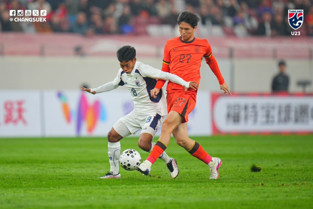 U23 Trung Quốc (áo đỏ) thoát thua U23 Triều Tiên. (Nguồn: FAT)