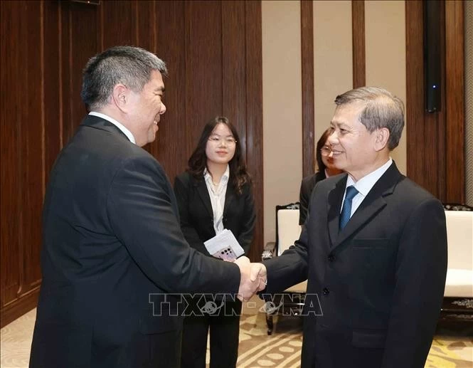 Trưởng Ban Nội chính Trung ương Lê Minh Trí tiếp đoàn Đảng Dân chủ Thái Lan. (Nguồn: TTXVN)