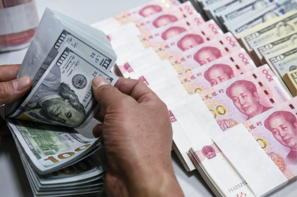 trung quoc ban rong ngoai te giam manh trong thang 82017