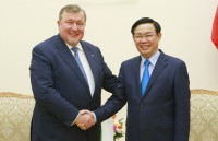 pho thu tuong vuong dinh hue tiep doan quy tien te quoc te