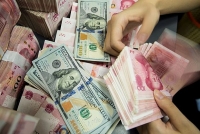 Mỹ chính thức 'tháo mác' thao túng tiền tệ cho Trung Quốc
