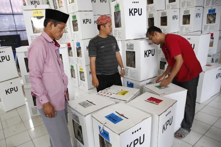 hau bau cu indonesia lanh dao cac to chuc keu goi hai phe tranh cu kien nhan