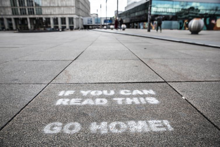 dich covid 19 han che tiep xuc xa hoi phat huy tac dung so ca nhiem moi o duc giam manh my phu nhan tran lot lo khau trang cua berlin