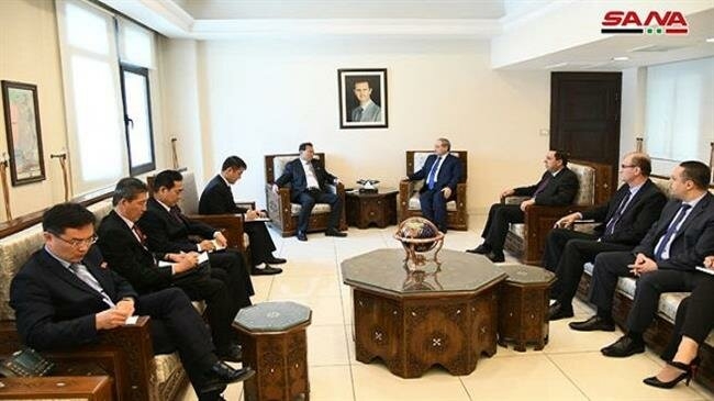 trieu tien muon giup tai thiet syria va doi pho voi lenh trung phat cua my