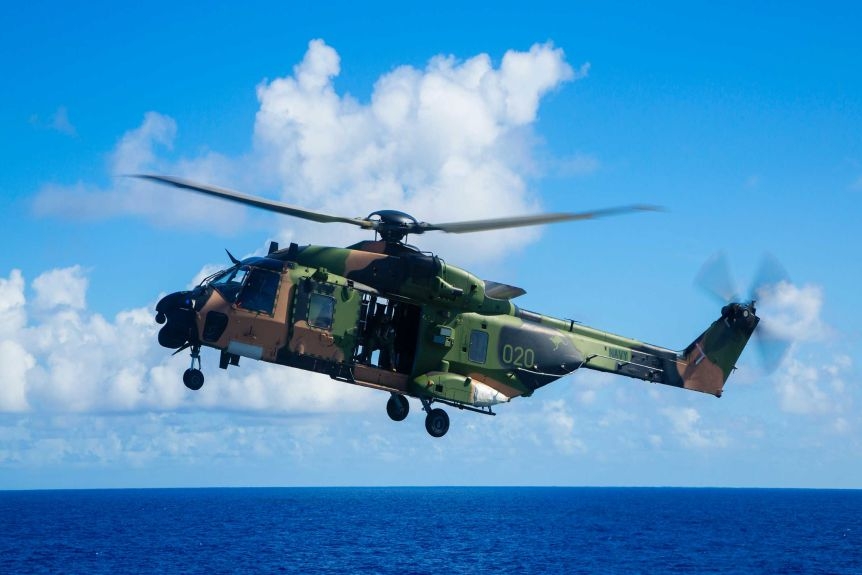 phi cong australia bi tan cong bang laser o bien dong