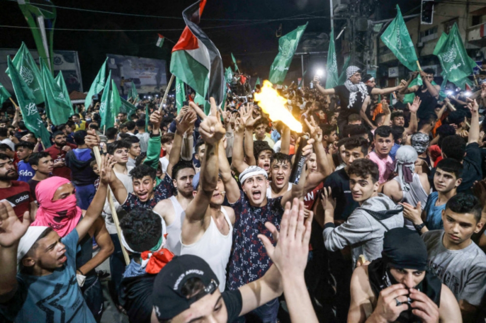 Lệnh ngừng bắn ở Dải Gaza: Hamas tuyên bố chiến thắng; Ngoại trưởng Mỹ sắp sang Trung Đông và dư luận quốc tế. (Nguồn: AFP)