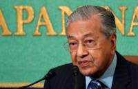 thu tuong malaysia tro lai va loi hai hon xua