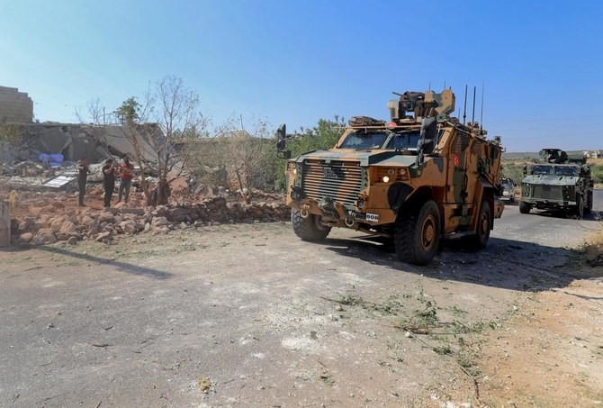 Xe bọc thép của Thổ Nhĩ Kỳ đến làng Iblin ở khu vực Jabal Al-Zawiya thuộc tỉnh Idlib, Tây Bắc Syria. (Nguồn: AFP)