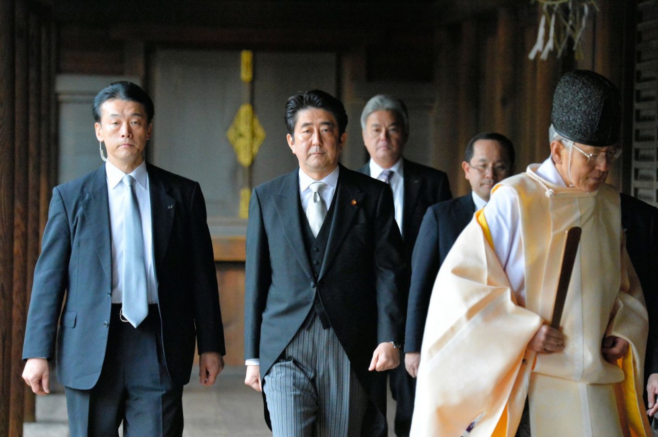 Chuyến thăm của Abe tới đền Yasukuni ở Tokyo vào năm 2013 đã làm gia tăng căng thẳng với Trung Quốc và Hàn Quốc. Các chuyến viếng thăm đền thờ của các nhà lãnh đạo Nhật Bản gây tranh cãi vì cơ sở này là nơi giam giữ những tội phạm chiến tranh Hạng A cũng 