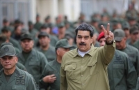 bi colombia de doa tong thong venezuela trieu tap hoi dong quoc phong