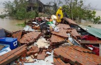 nguoi viet tai lao huong ve ung ho nan nhan thien tai trong nuoc