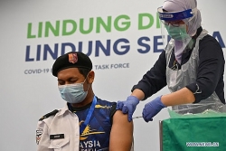 Malaysia: Số ca mắc mới tăng kỷ lục, Covid-19 lan đến quốc hội, vaccine Trung Quốc 'chiếm sóng'